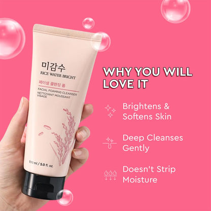 Hand holding a tube of skincare product with text on a pink background