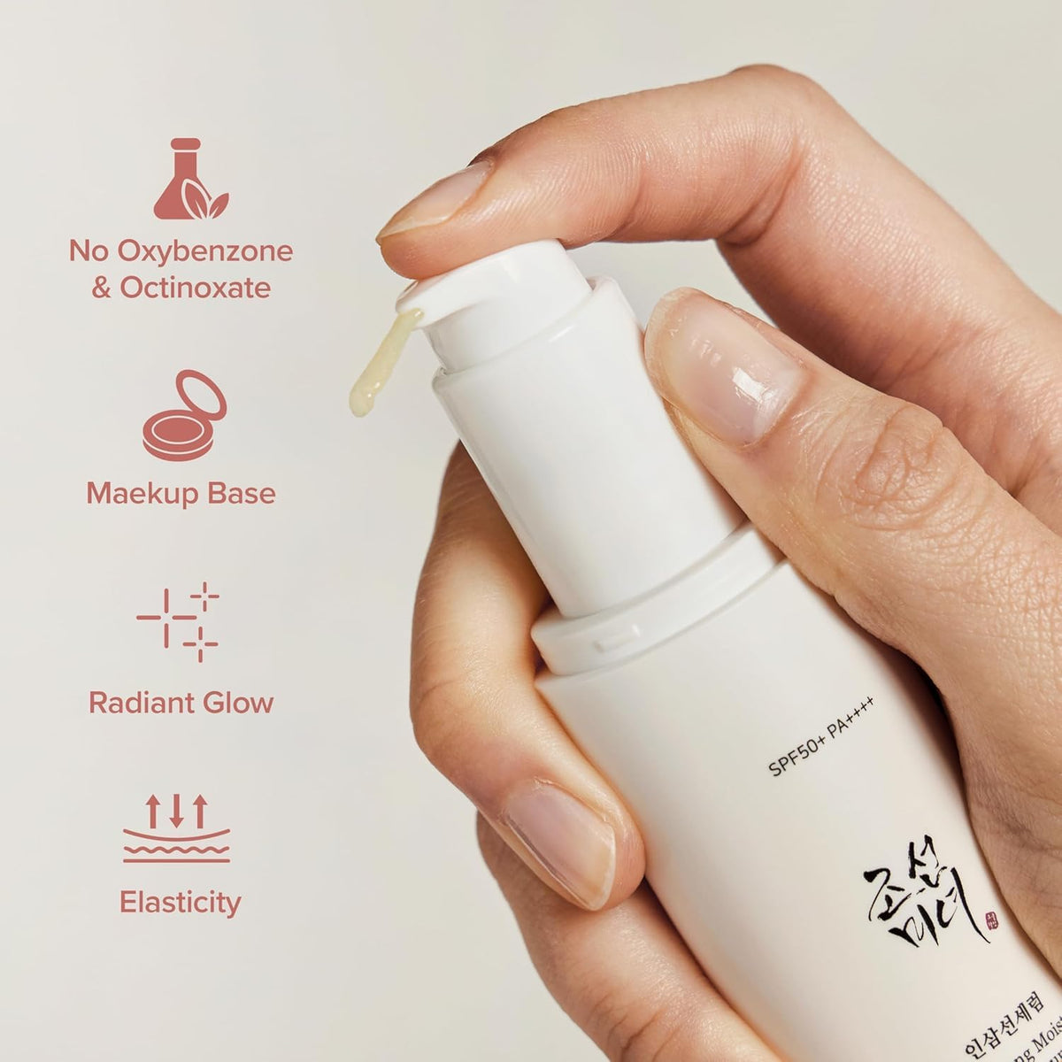 Hand holding a skincare product with text highlighting features on a light background