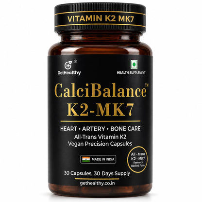 Vitamin K2 MK7 supplement bottle with black and gold label on a white background