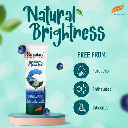 Himalaya Whitening Vitamin C Blueberry Face Wash with product and benefits on a light blue background
