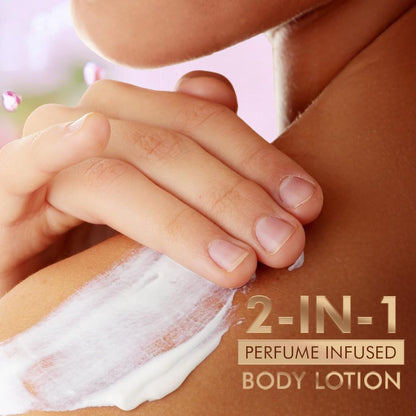Hand applying 2-in-1 perfume infused body lotion to skin with a blurred background