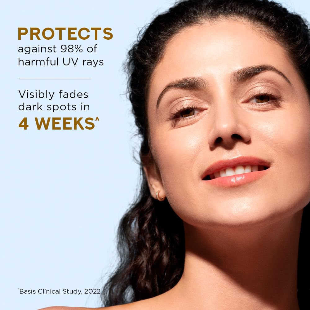 Woman with a clear complexion on a light blue background with text about UV protection and dark spot fading.