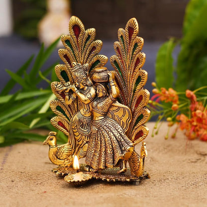 Collectible India Peacock Design Radha Krishna Idol Showpiece with Diya for Puja and Home Decor (7 x 5 Inches), Metal, Gold (1 Piece)