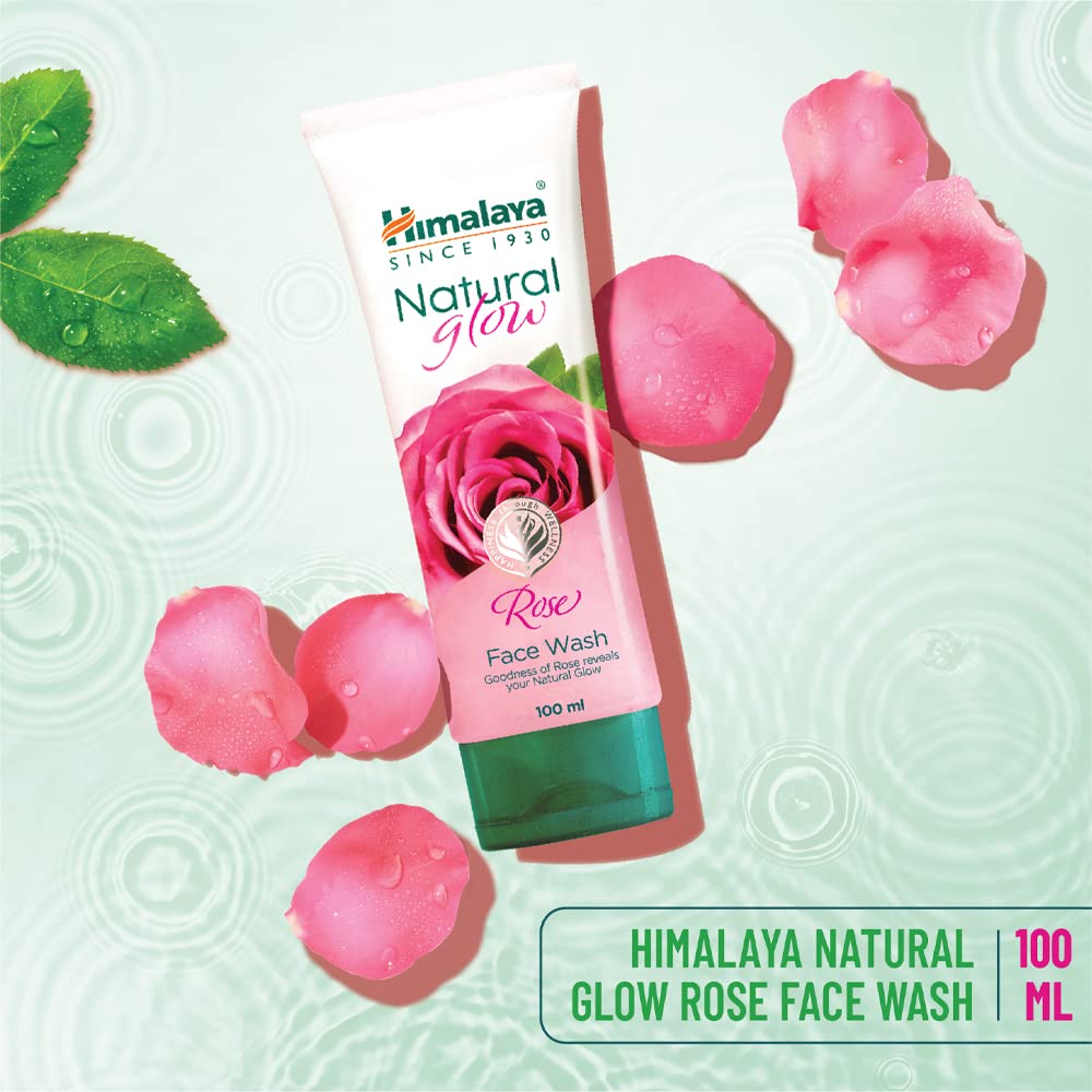 Himalaya Natural Glow Rose Face Wash with rose petals on a light green background