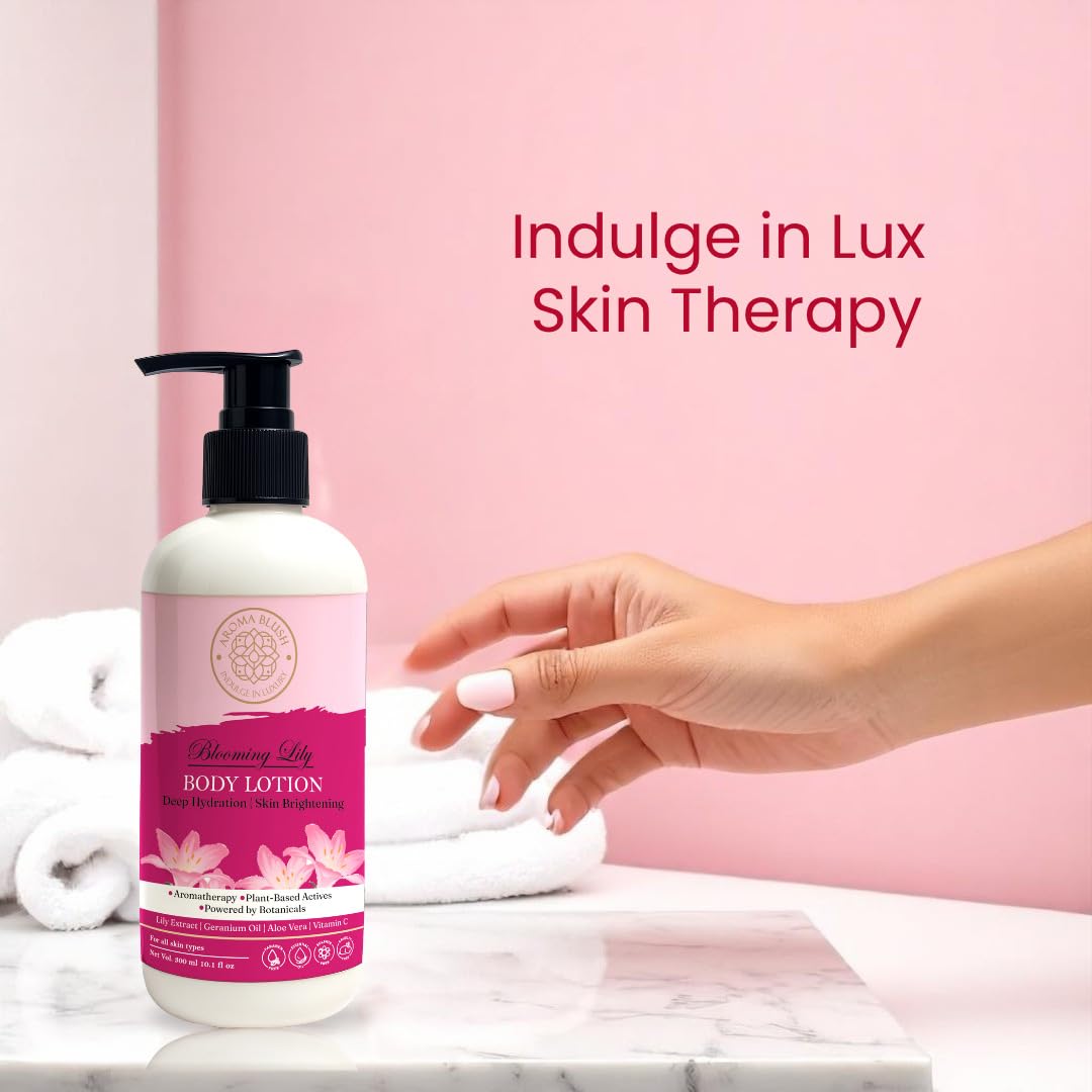 Body lotion bottle with pink label on a marble surface against a pink background with text 'Indulge in Lux Skin Therapy'.