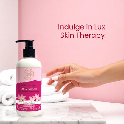 Body lotion bottle with pink label on a marble surface against a pink background with text 'Indulge in Lux Skin Therapy'.