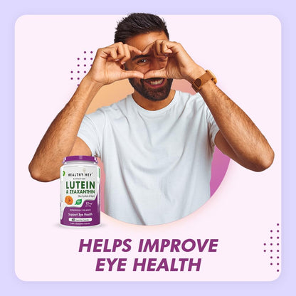 Man holding a supplement bottle with text about improving eye health on a light purple background