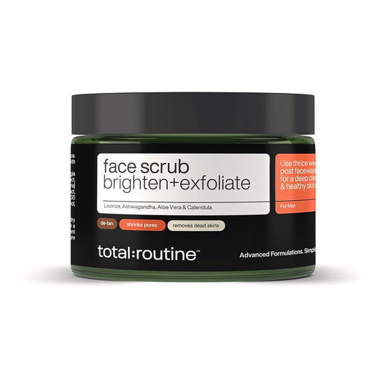 Jar of face scrub with 'total:routine' branding on a white background