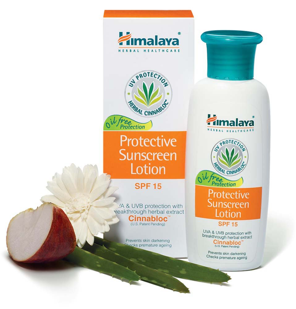 Himalaya Protective Sunscreen Lotion with packaging and natural elements on a white background