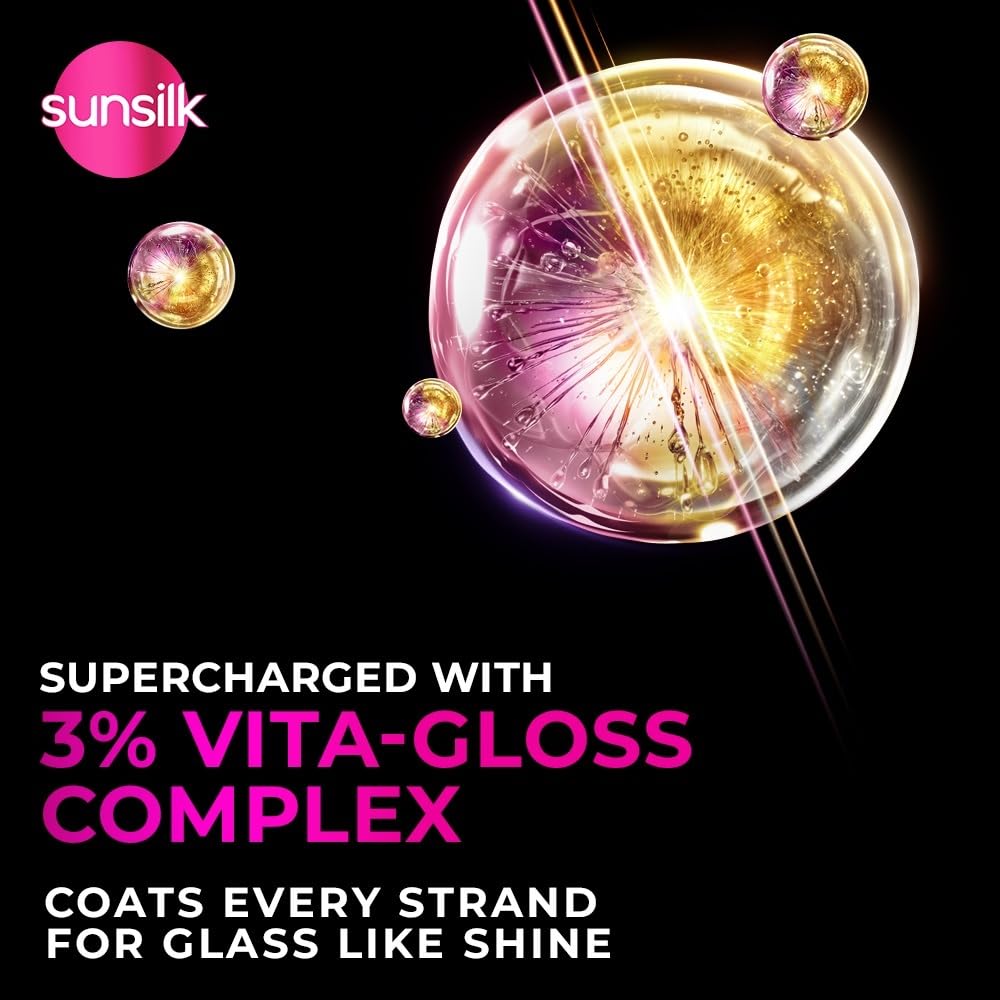 Sunsilk advertisement with a colorful sphere and text about Vita-Gloss Complex on a black background