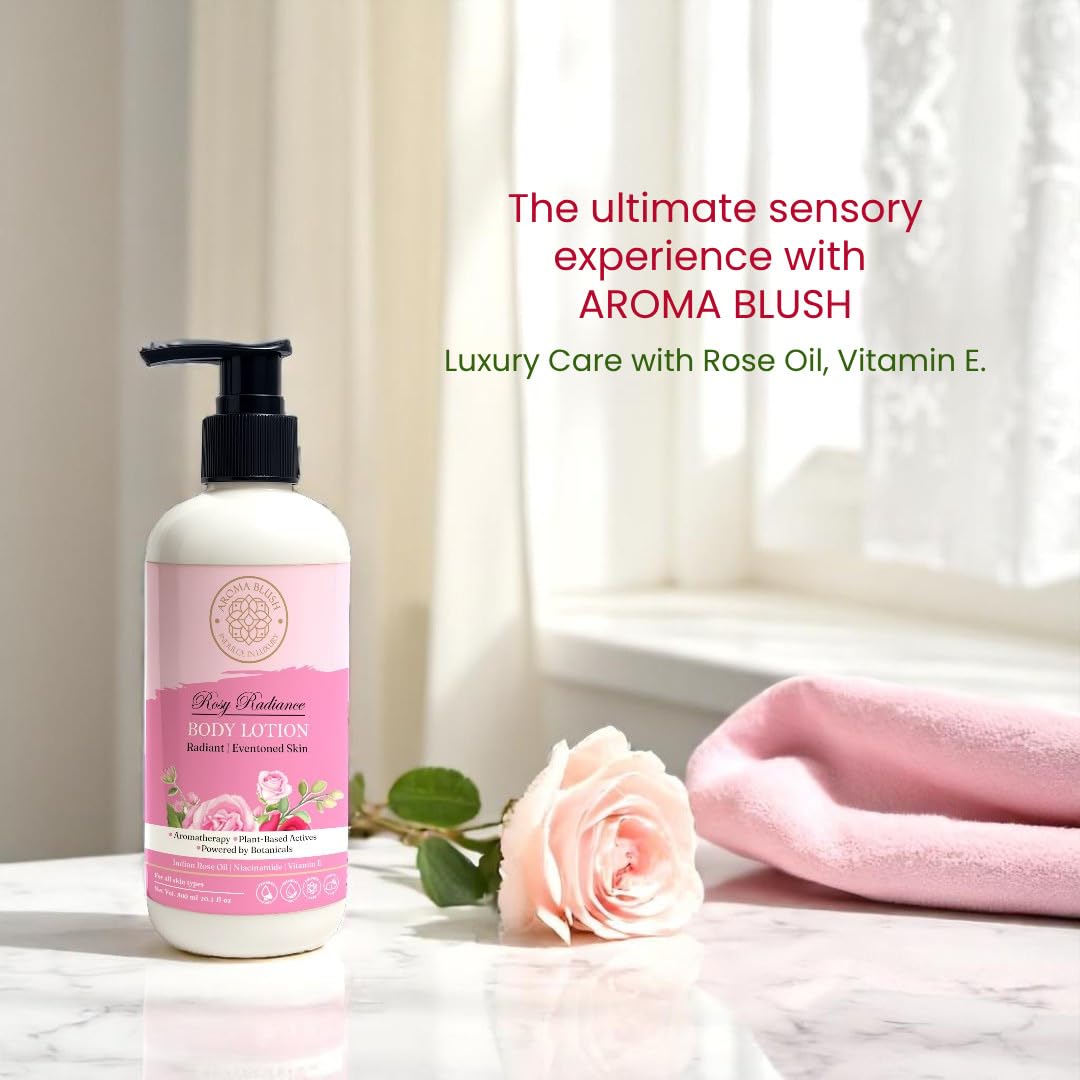Body lotion bottle with pink label on a marble surface with a rose and towel, text about Aroma Blush.