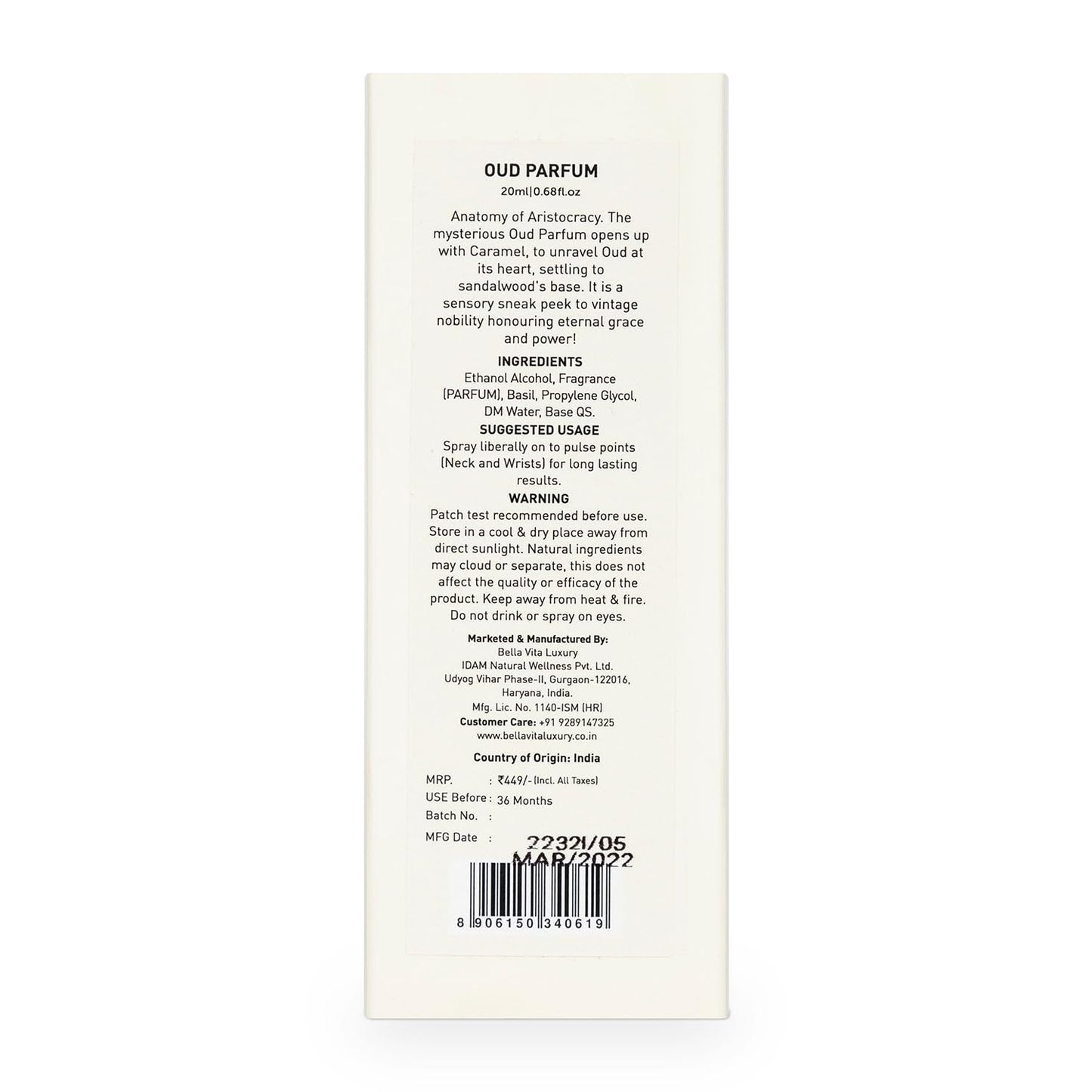 Back of a perfume packaging with text and a barcode on a white background