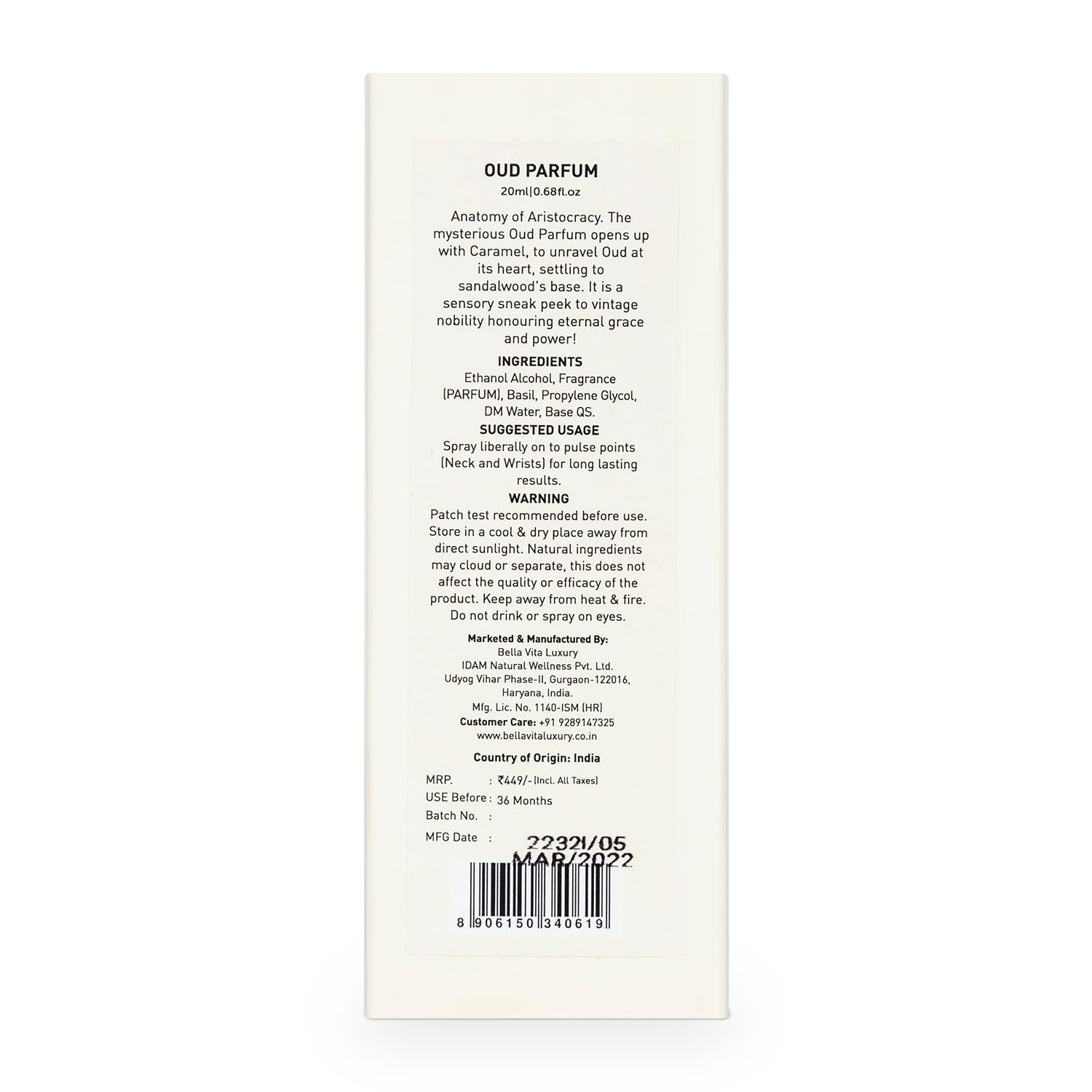 Back of a perfume packaging with text and a barcode on a white background