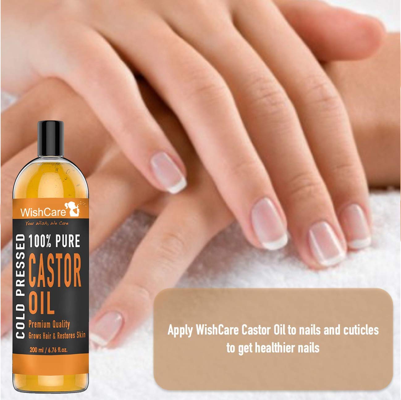 WishCare castor oil bottle with hands applying the oil to nails on a textured surface