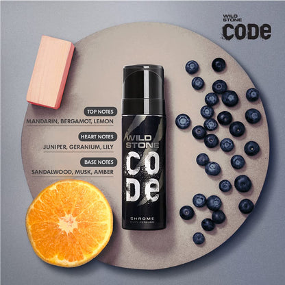 Wild Stone Code deodorant bottle with fruit and wooden block on a gray background