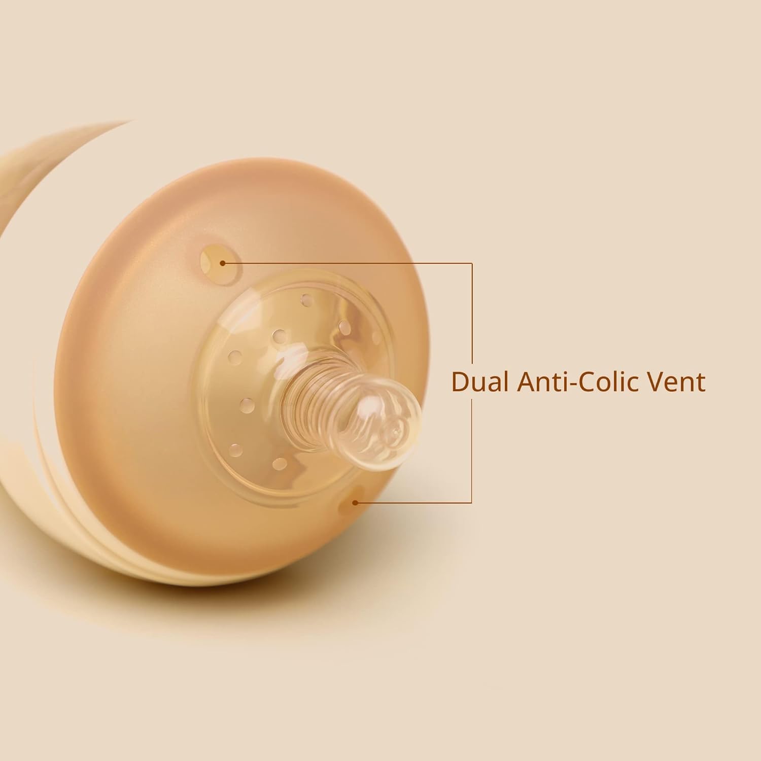 Bottle cap with dual anti-colic vent on a beige background