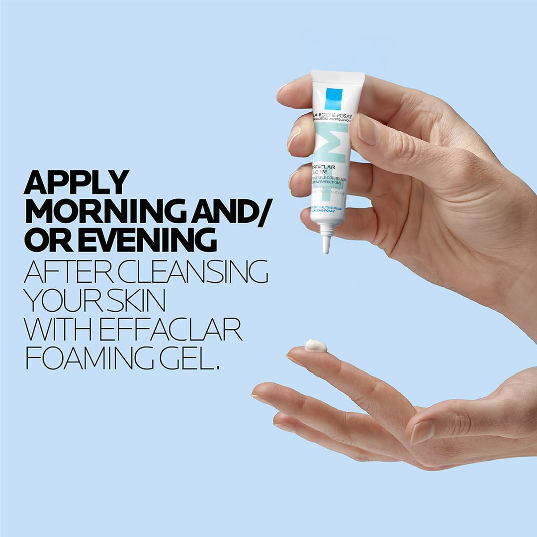 Hand holding a skincare product with text on a light blue background