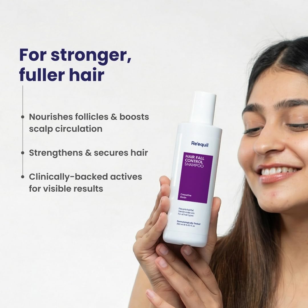 Woman holding a bottle of Reafirm hair care product with text about its benefits on a light background