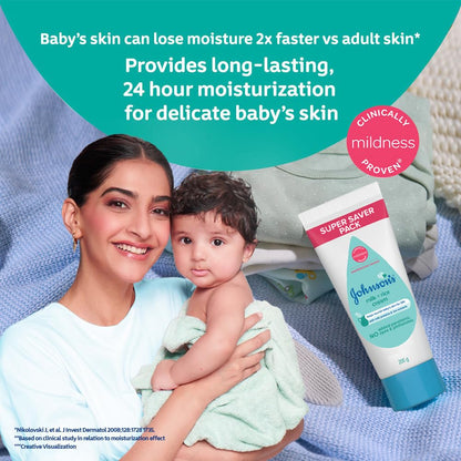Woman holding a baby with Johnson's Baby lotion on a blue blanket