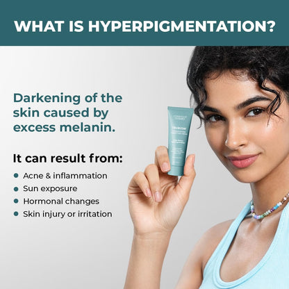 Woman holding a skincare product with information about hyperpigmentation on a gray background