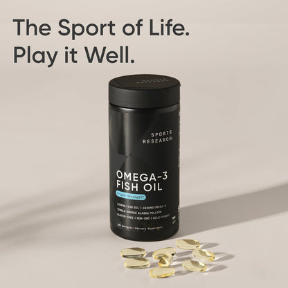 Black bottle of Sports Research Omega-3 Fish Oil with fish oil capsules on a beige background.