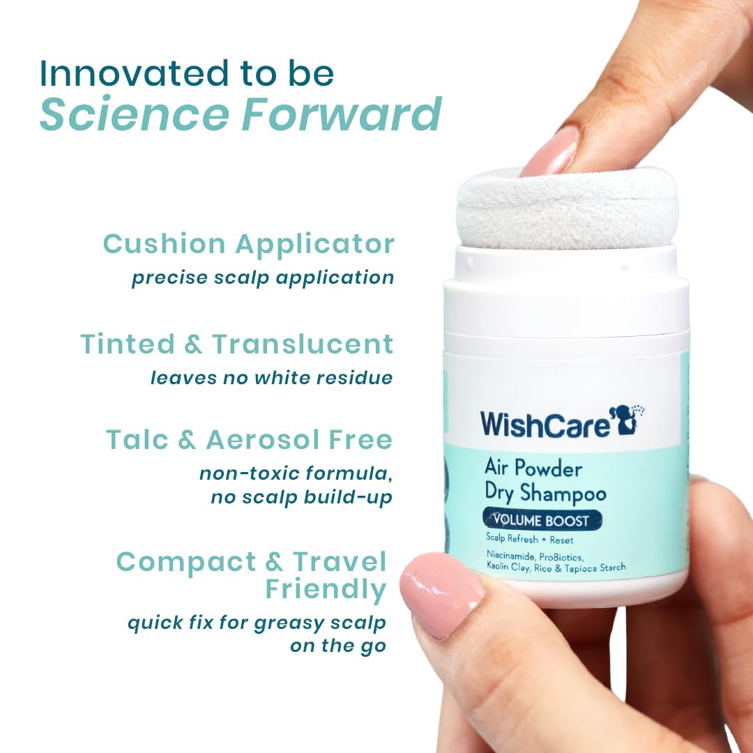 WishCare air powder dry shampoo with cushion applicator held by a hand, against a white background.