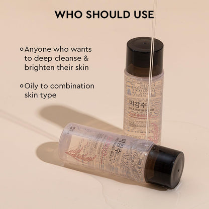 Two skincare bottles with text indicating usage and skin type suitability on a beige background