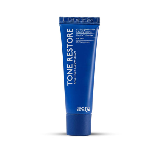 Blue tube of Tone Restore cream on a white background