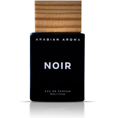 Black perfume bottle labeled 'Noir' by 'Arabian Aroma' with a wooden cap on a white background.