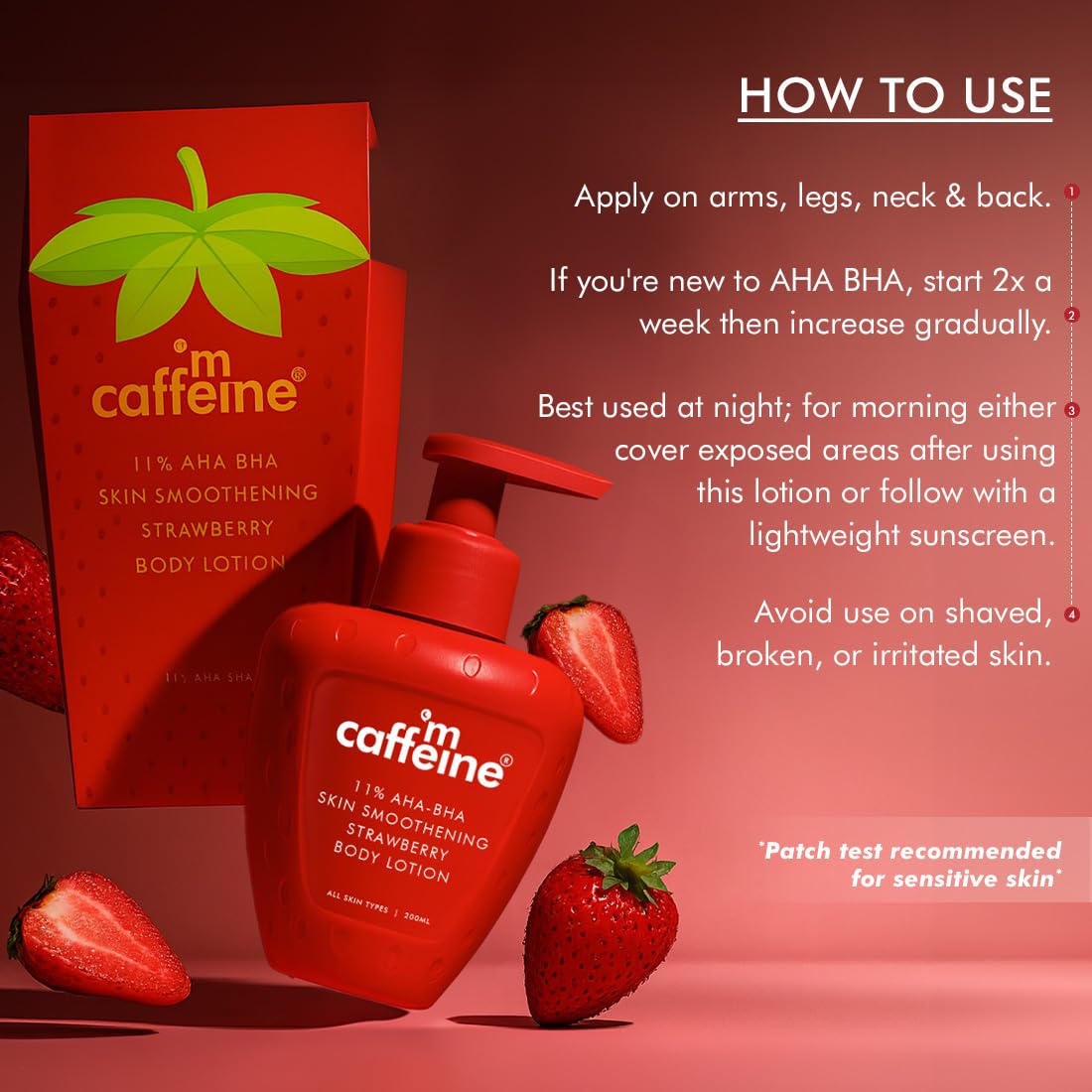 Red 'm caffeine' body lotion with packaging and strawberries on a red background