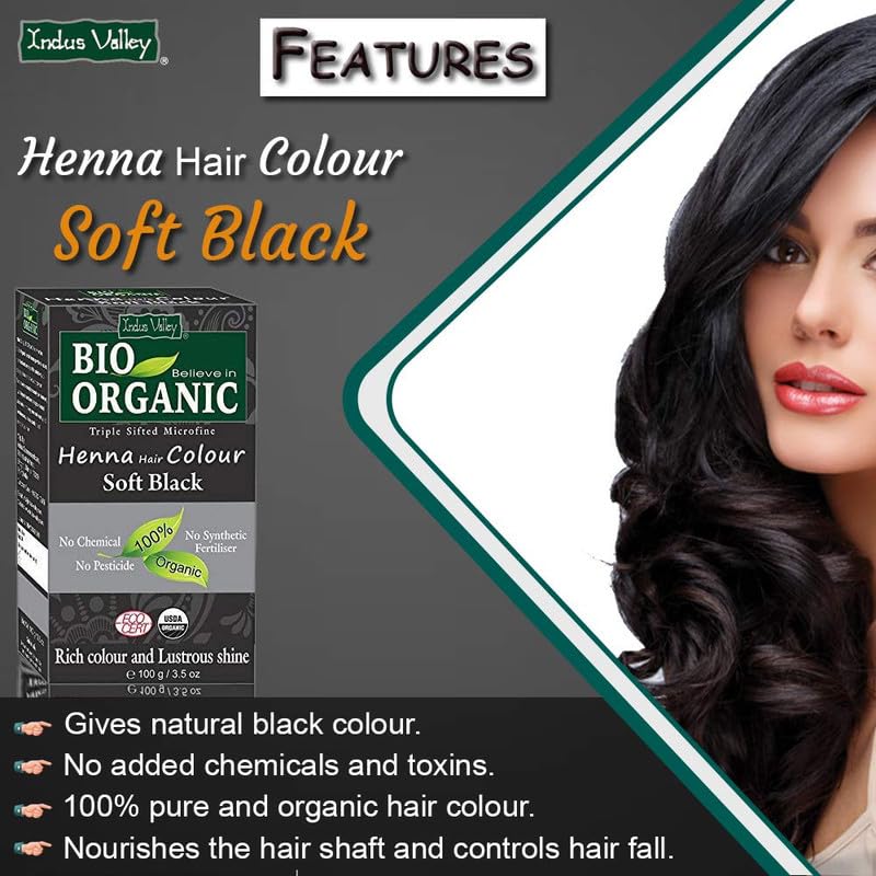Advertisement for Indus Valley Henna Hair Colour Soft Black with a woman's face and hair.
