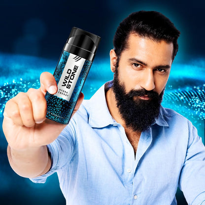 Man holding a Wild Stone product with a blue and black design