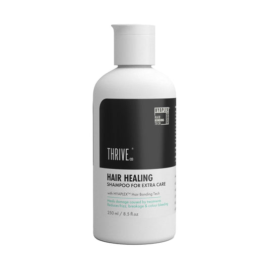 Thrive hair care product bottle on a white background