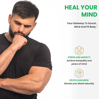 Man with a beard and muscular arm, with text about mental health and wellness on a green background