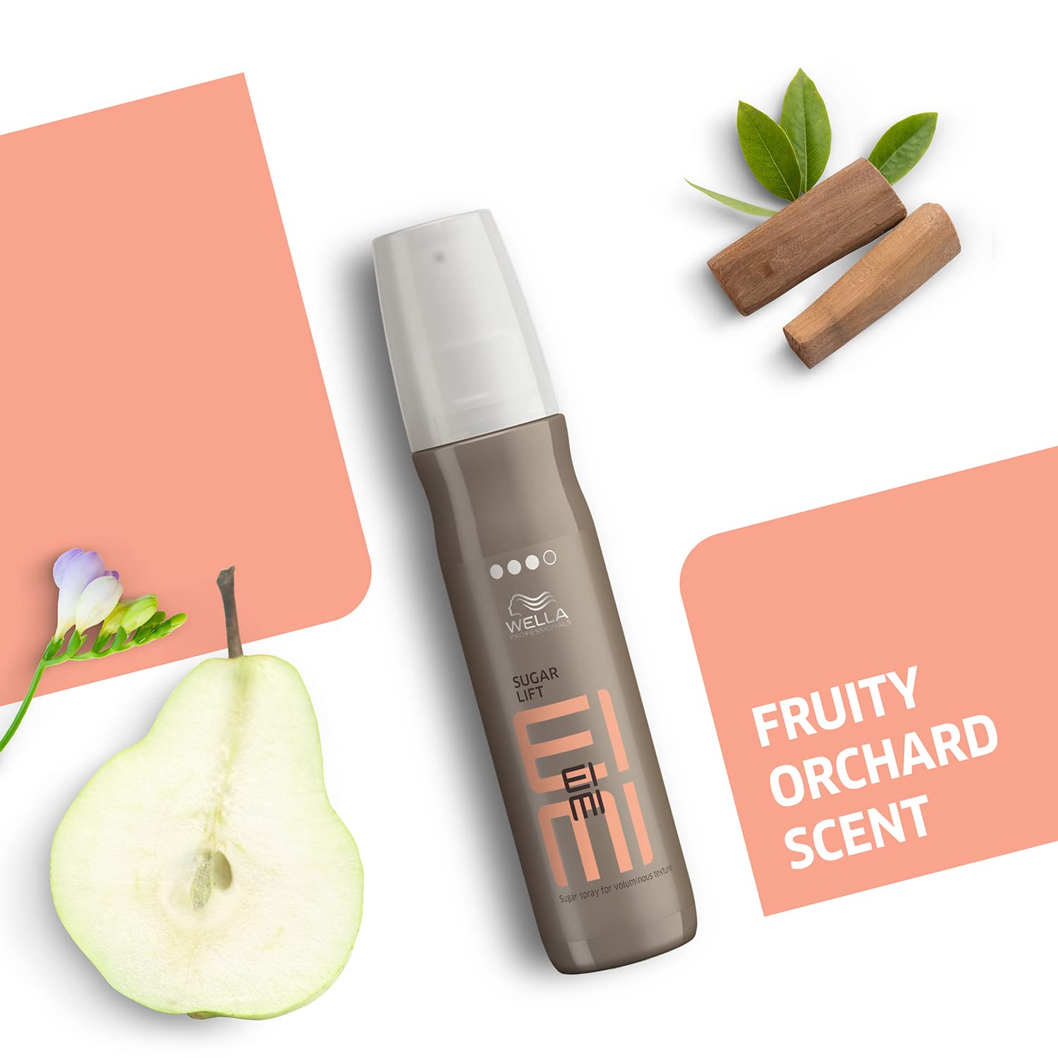 Wella EIMI hair product with pear, cinnamon sticks, and leaves on a white background