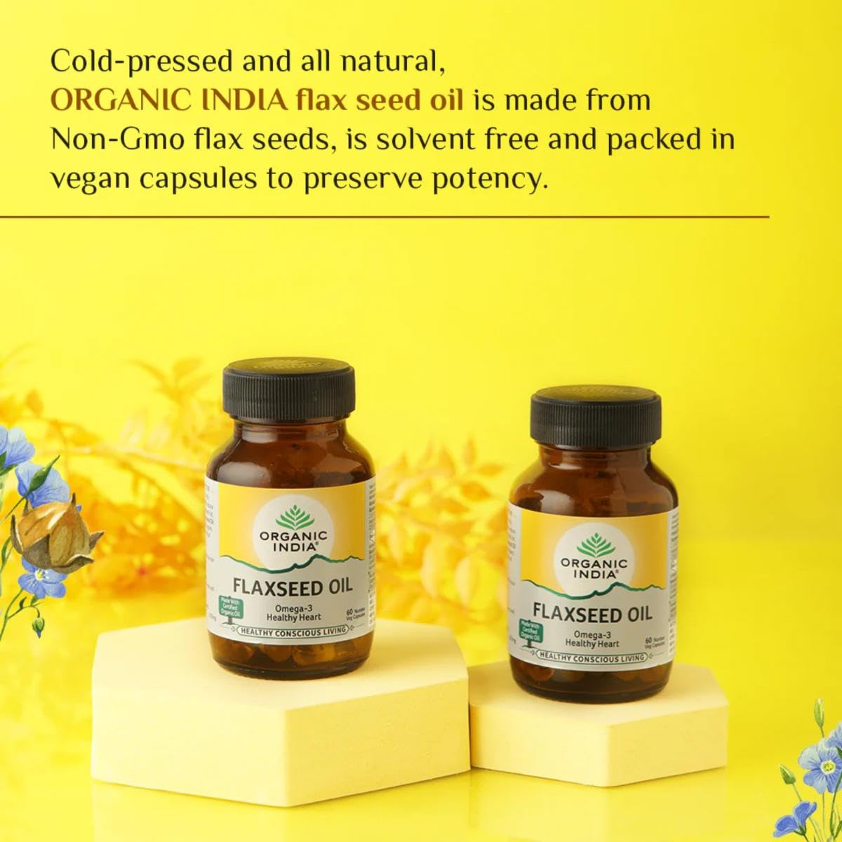 Two bottles of Organic India flaxseed oil on a yellow background with text about the product.