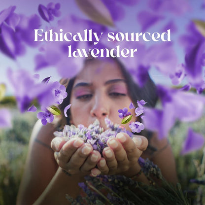 Woman holding lavender flowers with text 'Ethically sourced lavender' in a field of lavender.