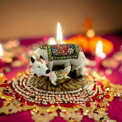 JIYANSH Creation Kamdhenu Cow and Calf Statue for Home Decor - Handcrafted Polyresin Marble Finish Vastu Showpiece for Living Room Pooja Mandir - Large 6 Inch (White Gold)