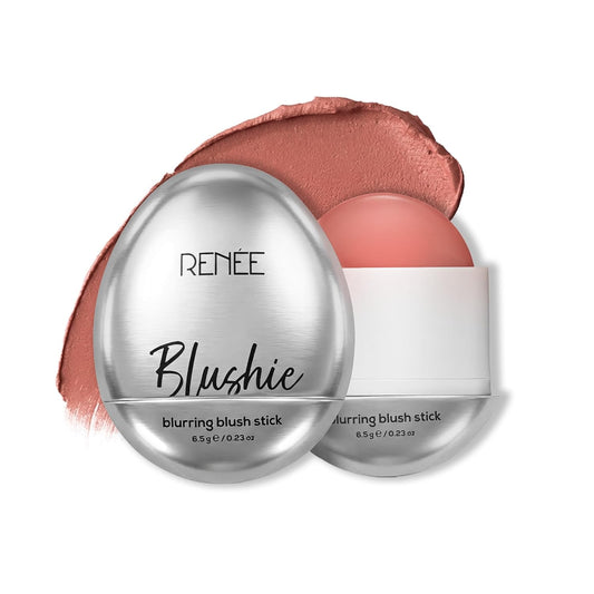 Blushing blush stick with silver cap and visible blush color on a white background