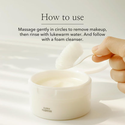 Hand using a white spoon to scoop cream from a jar with text on how to use it.
