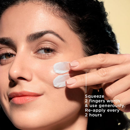 Woman applying cream to her face with text on how to use it.