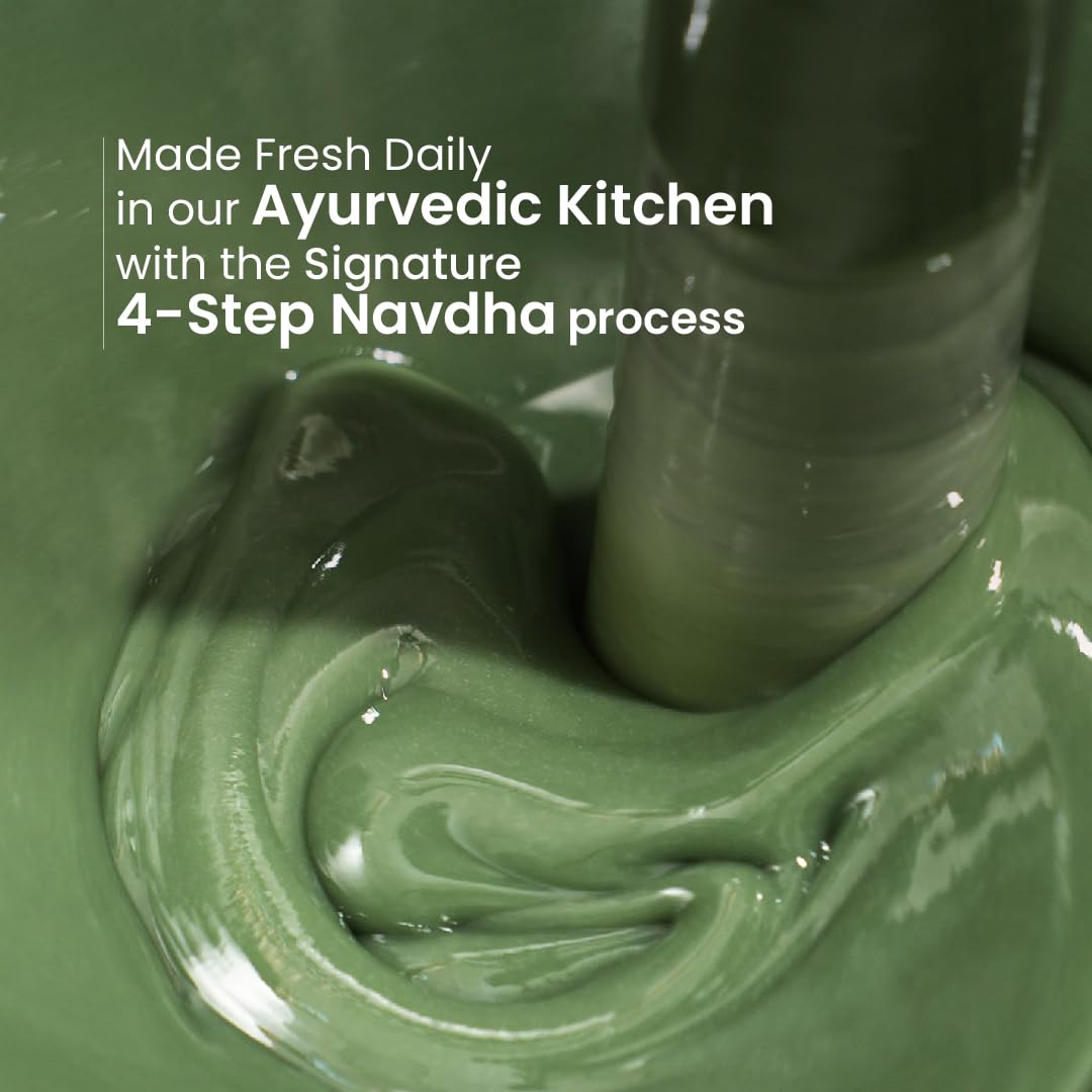 Close-up of green paste being stirred with text about Ayurvedic kitchen process.