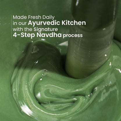 Close-up of green paste being stirred with text about Ayurvedic kitchen process.