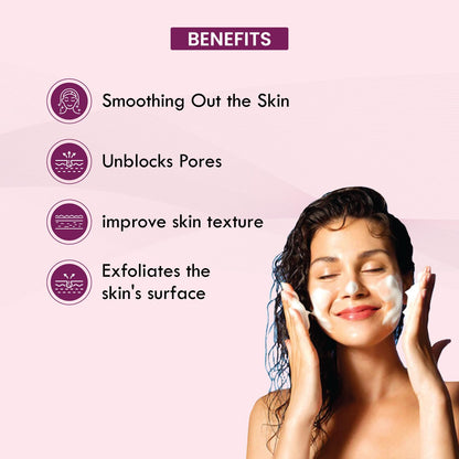Woman applying facial mask with benefits listed on a pink background
