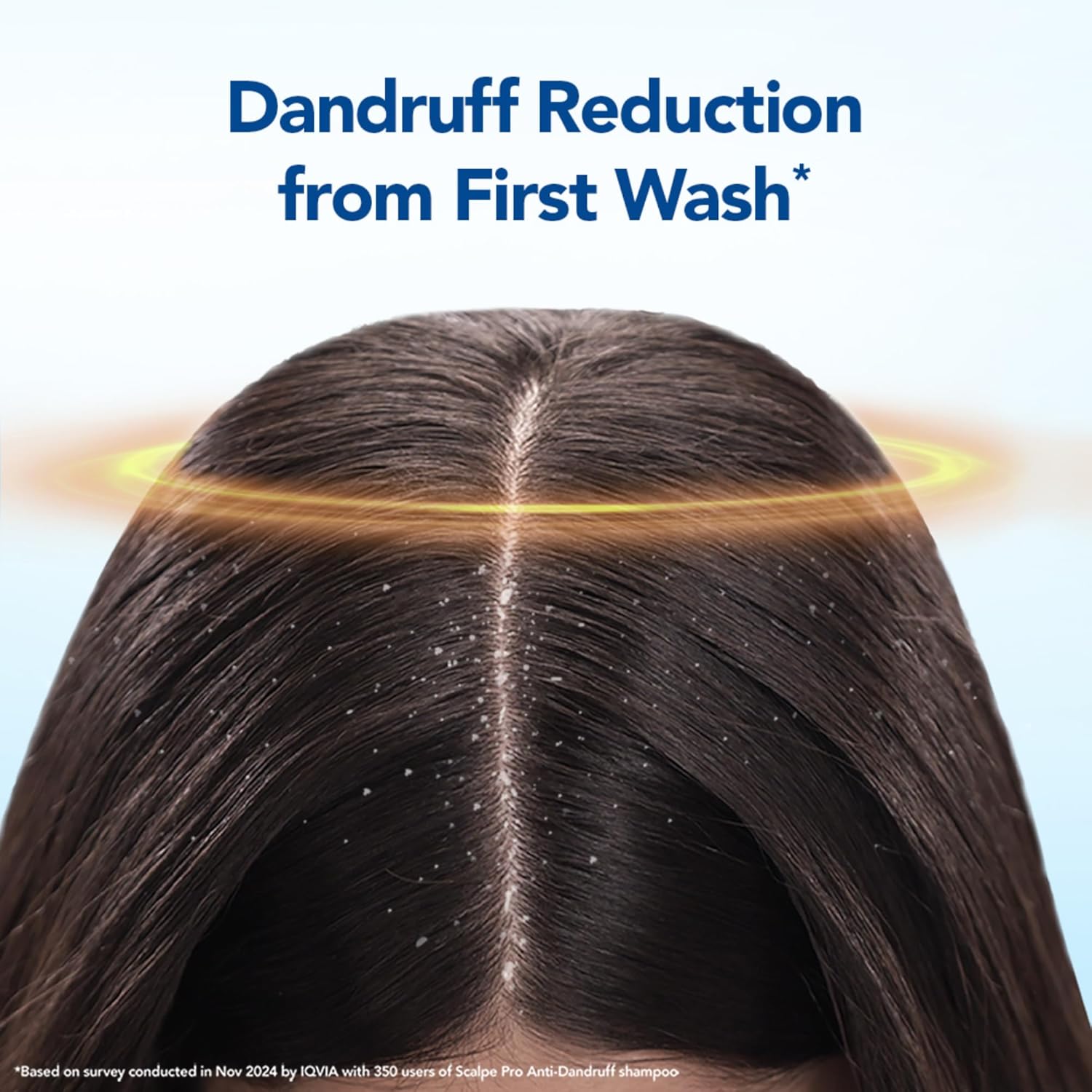 Back view of a person with dandruff reduction from shampoo on a blue background