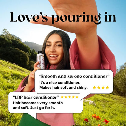 Woman holding a bottle of hair conditioner with text about its benefits in a scenic outdoor setting.