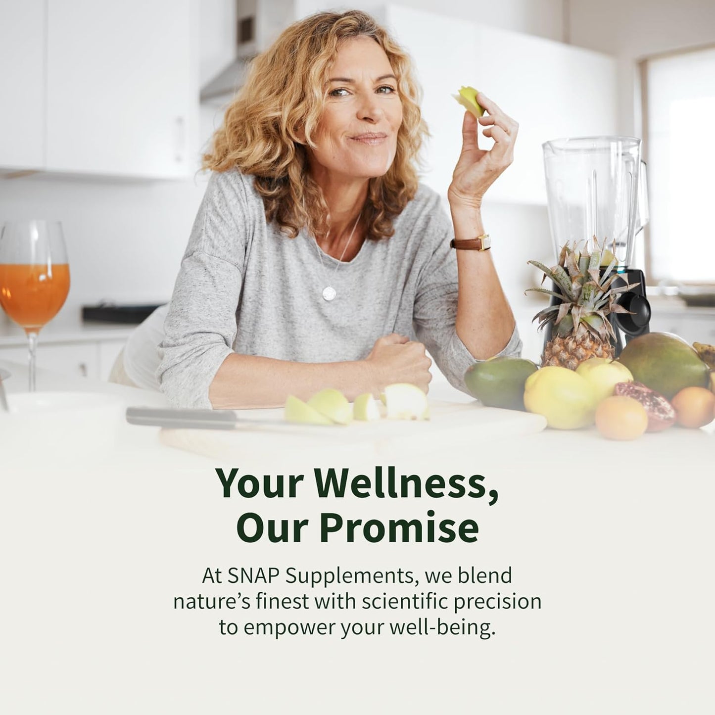 Woman in a kitchen with fruits and a blender, promoting SNAP Supplements.