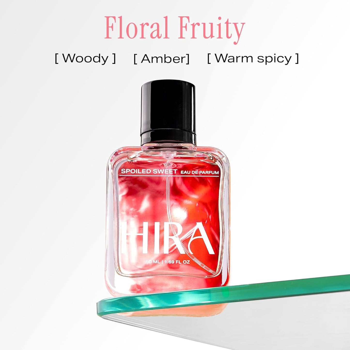 Perfume bottle labeled 'HIRA' with flavor description on a white background