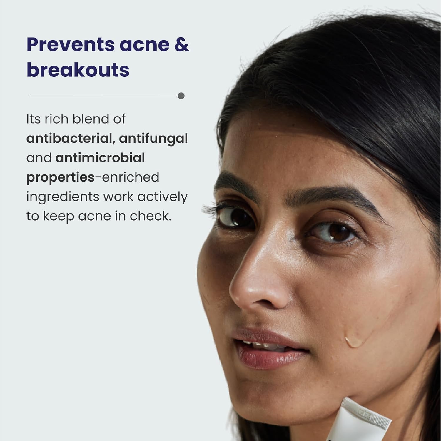 Woman applying skincare product with text about preventing acne and breakouts.