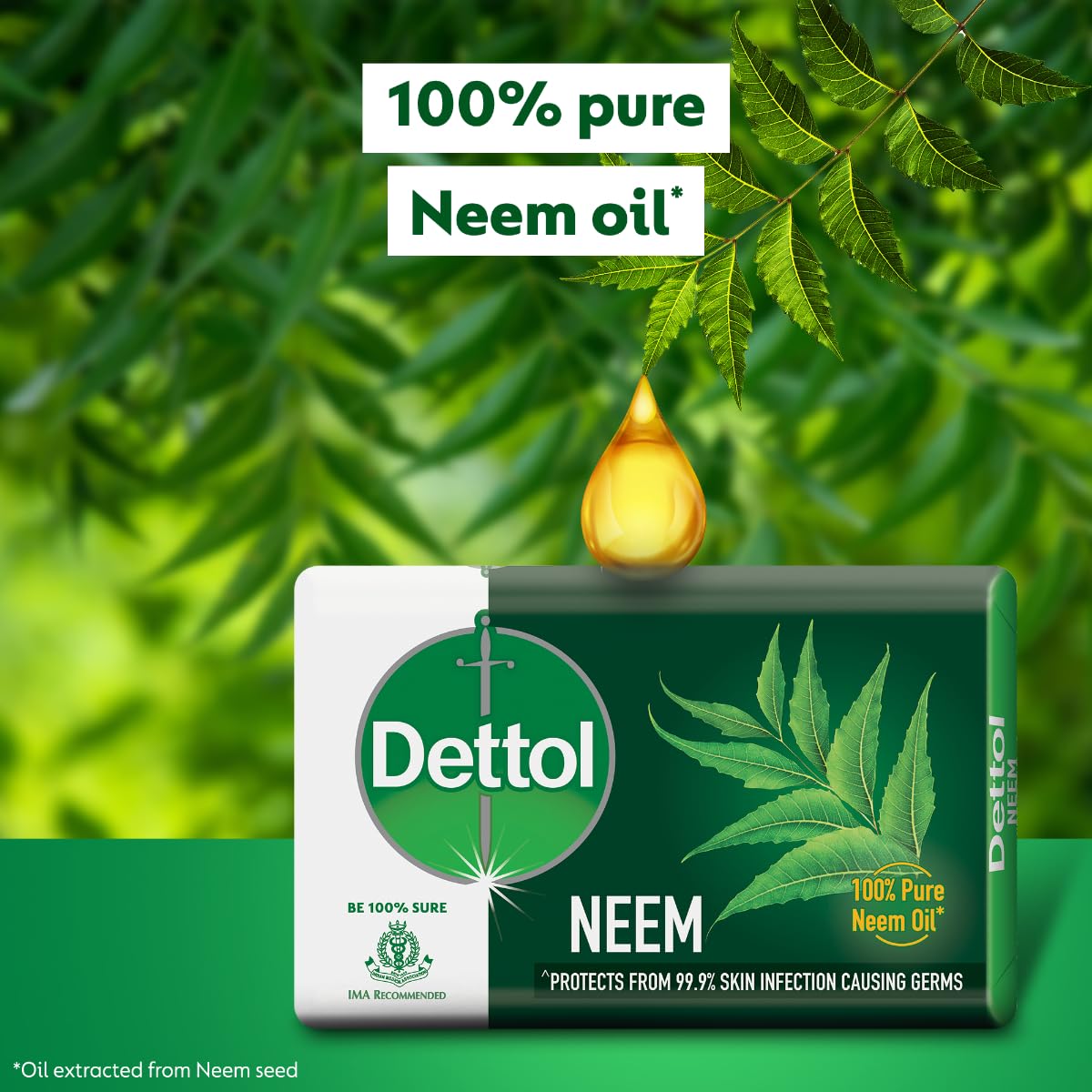 Dettol Neem soap with neem oil droplet and leaves on a green background